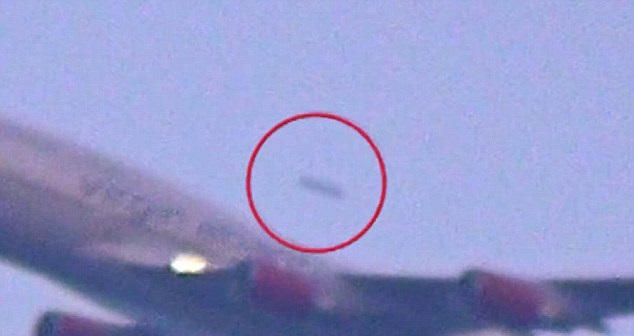 专家暂亦无法证实该黑点（红圈）究竟所属何物