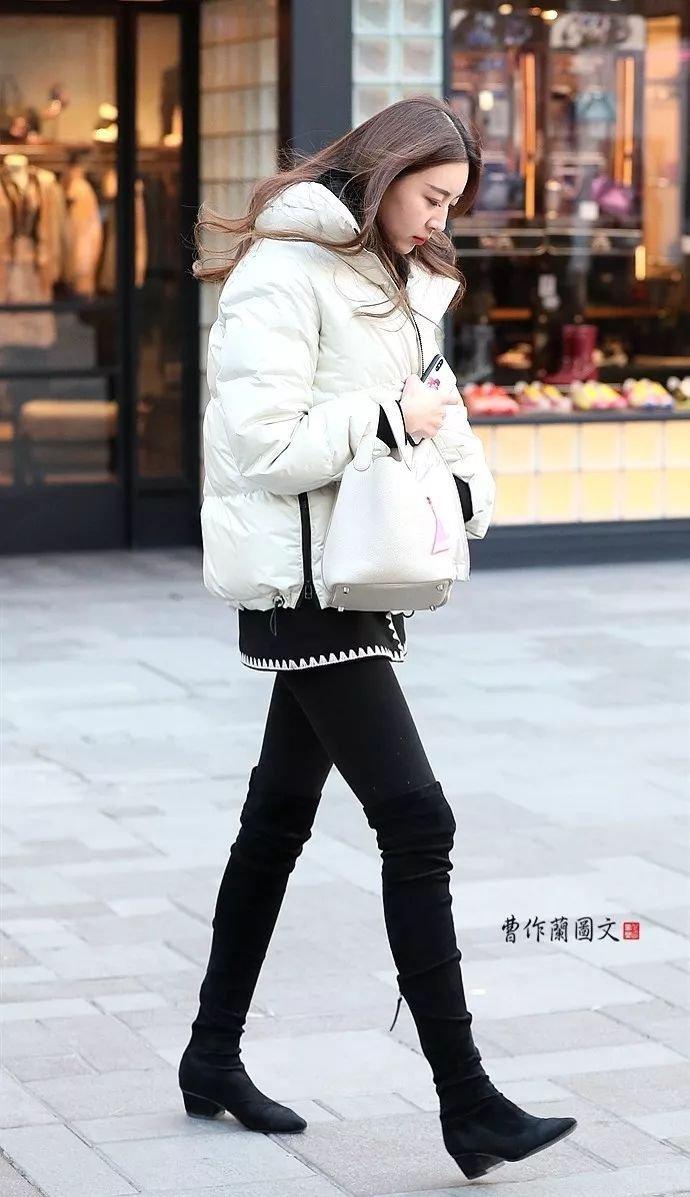 街拍:高筒靴美女,更多一层性感