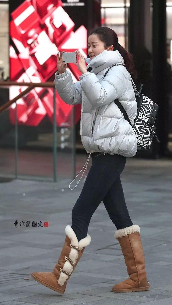 街拍:高筒靴美女,更多一层性感