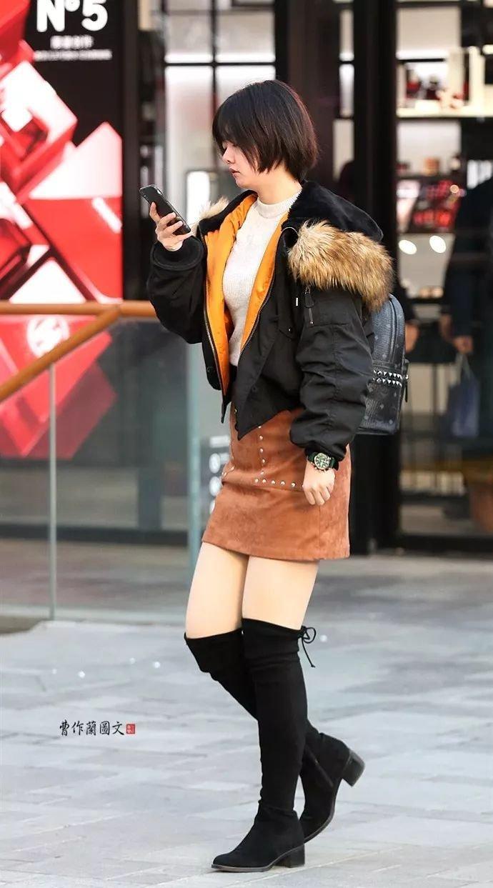 街拍:高筒靴美女,更多一层性感